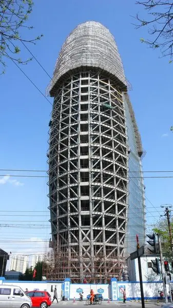 人民日报新大楼披上"土豪金" 盘点全国16大奇葩建筑