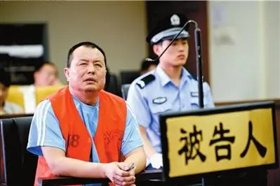 李隆隆出庭受审。蒲东峰 摄