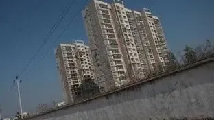 谁有权让小区拆围墙 称开放小区需居民同意